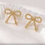 Elegant Gold Bow Earrings Photo 1