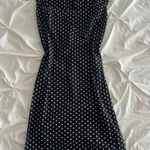 Elegant Black and White Polka Dot Midi Dress Photo 0
