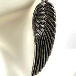 Silver tone angel wing earrings Photo 1