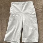 90degree by Reflex biker shorts with side pockets. Size XS. Color light gray. Gray Photo 0