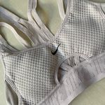 Nike  Dri-FIT ADV Indy Women's Light-Support Padded Strappy Sports Bra Photo 1