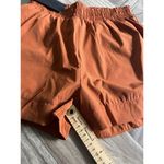 Alphalete  Woman’s Infinity Stride Short W/ Liner - Sour Tangerine, Size Small Photo 6