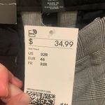 H&M  | skinny fit houndstooth patterned dress pants Photo 3