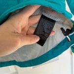 The North Face Women's  Teal Colored Hyvent Rain Coat Size Extra Small Photo 8