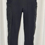 Fabletics  Black High-Waisted 7/8 Pocket Leggings with Mesh Sides Size Medium Photo 0