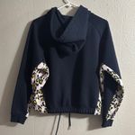 Chic Black Hoodie with Leopard Print Sleeves Size M Photo 3