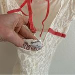 Urban Outfitters  Kimchi Blue Penelope Lace Keyhole Back Asymmetric Top Photo 8