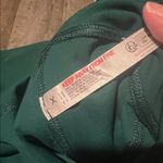 NWOT Free people movement Deep Green Activewear Pants flare leg with slit size L Size L Photo 3