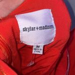 Skylar + Madison Orange floral romper Photo 2