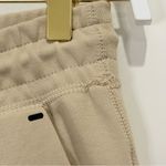 Nike  Tech Fleece Lounge Pants Joggers Womens XS Beige Sweatpants Zip Drawstring Photo 6