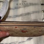 Coach Cream and Purple Floral Wristlet Photo 1