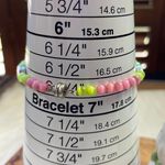 Green pink cats eye sing peace love faith bracelet Photo 6