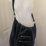 Unisex Grunge Gothic Punk Black leather crossbody shoulder messenger bag purse silver hardware multiple zippers & pockets Can also be a school bag as it can fit multiple books, tablets, laptop computer Photo 0