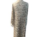 Size medium women’s long sleeve brown floral dress Photo 3