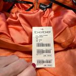 Bebe  Vintage Vanna style coral mini cocktail dress Photo 3