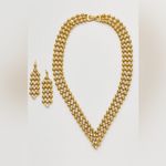 Gold Tone beaded V Photo 1