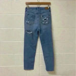 American Eagle ⭐️  light wash distressed mom jeans in size 4 Photo 2