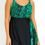 Jaclyn Smith  Teal and Black One-Piece Swimsuit Photo 0