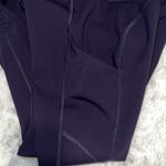 Lululemon speed up leggings 28” color; Dark Purple w/ Pink stripes size 4 EUC Photo 9