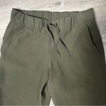Lululemon  On the Fly Crop Woven 23" Dark Olive Green Pants Photo 5