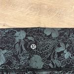 Lululemon Wunder Train High Rise Tight 25” in Logo Flourish Black Foil Photo 5