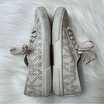 Michael Kors  Logo Off white/cream tennis shoes with gold hardware Photo 3