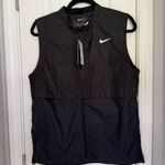 Nike women’s black vest size large Photo 0