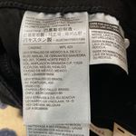 Levi's Levi’s 721 solid black distressed high rise skinny jeans size 27 Photo 10