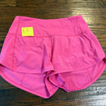 Lululemon  speed up shorts, sonic pink size 4  Photo 0