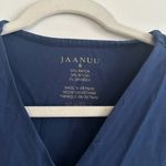 Jaanuu  navy scrub top size small Photo 2