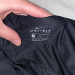 Nike Dri-Fit Leggings 7/8 Slightly Cropped Medium Black with Purple Stripe Photo 3