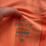 Nike  Women's Athletic Dry Fit Skort - Orange and Burgundy Photo 1