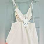 ZARA  Jumpsuit wide leg with cut out details size med in a ivory cream color Photo 9