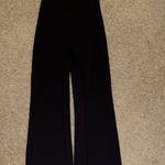 Black Open Back Flare Jumpsuit Size L Photo 0