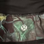 Lululemon Black and Floral Pleated Tennis Skort Photo 1