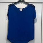 Coveted Clothing Blue Women's oversized Top size small. Photo 0