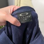 Oakley  Asymmetrical Navy Blue Women's Top with Black Accents Size Large Photo 4