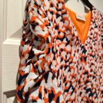 The Pants Store orange and blue top. Size M
Excellent condition Photo 2
