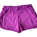 Athleta women's fuchsia athletic shorts size small panty lined and pockets Photo 0
