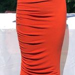 Alice + Olivia | Mindie Ruched Midi Fitted Skirt in Rust Terracotta Photo 0