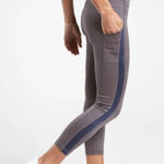 Athleta  Ultimate Stash Pocket 7/8 Tight leggings in a grey/mauve color XXS Photo 0