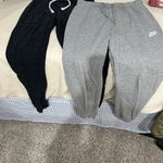 Nike Set of 2 Women's Black and Gray Joggers Photo 1