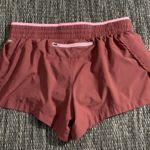 Fabletics Breathe Mid-Rise Lined Run Shorts Maroon Photo 1