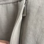 Wilfred Size 10 beige mini skirt with flap pockets Photo 1