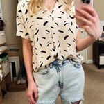 Primark Short Sleeved Blouse Top Shirt Ivory and Black Paint Brush Graphic Photo 0