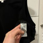 AGOLDE  Della Asymmetric T Shirt in Black Photo 5