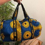 Blue yellow colorful patchwork large duffle travel carryon bag purse luggage #tribal #boho #retro #african #indie multicolored black trim Measurement in pics. Great condition Photo 0
