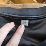 Black and orange women’s Tate McRae jersey Size XL Photo 2