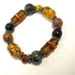 Yellow and green beaded stretchy bracelet Photo 1