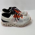 on cloud On Running Athletic Shoes White and Orange Photo 3